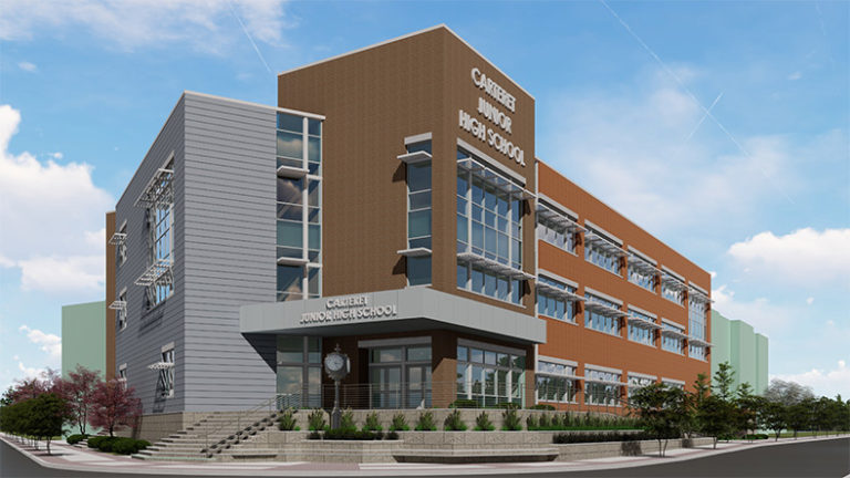 A rendering shows the exterior of the Carteret Junior High School, located on the corner of a main intersection.