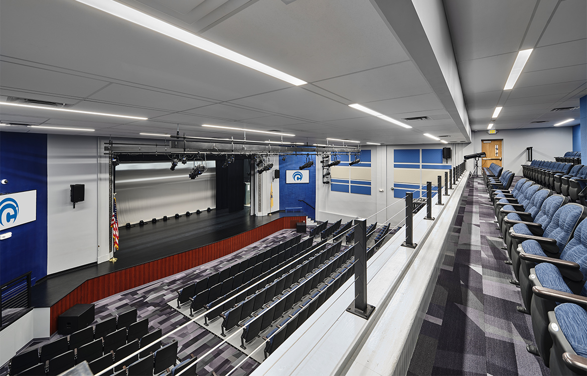 The Carteret High School auditorium is seen from the balcony level, overlooking the new stage and new seats.