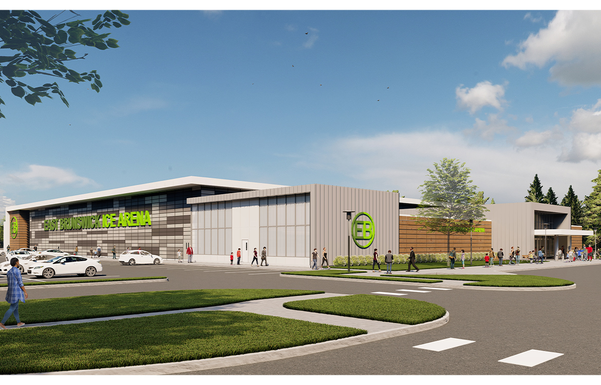 An exterior rendering of the East Brunswick Ice Arena, a one-story facility with an abundance of materials and dimensions, including metal, glass and composite materials that minic translucent fiberglass, cement and wood.