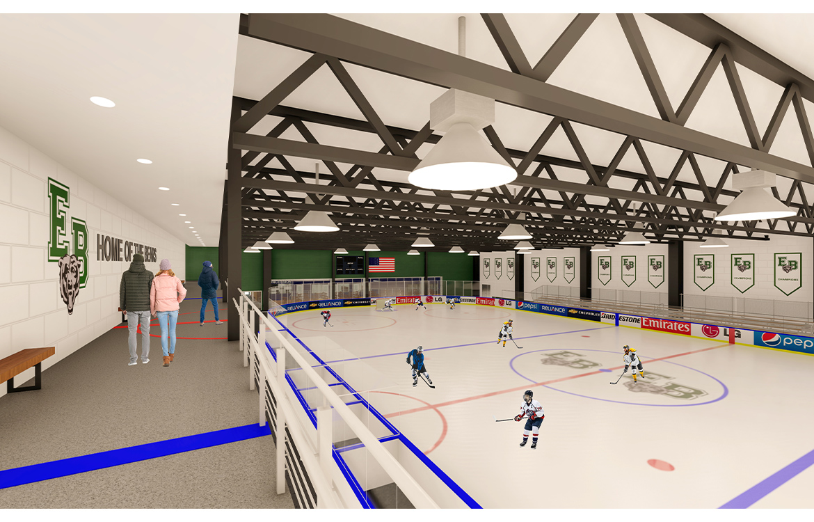 A rendering of the ice skating rink at the East Brunswick Ice Arena, overlooking the ice from the second story mezzanine level. In the distance, bleacher seating is also shown.