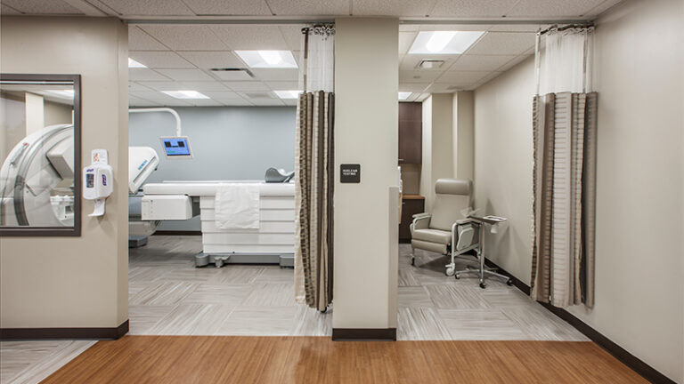 At the Hunterdon Healthcare Medical Office Building, one room shows Nuclear Medicine equipment and an adjacent patient room.