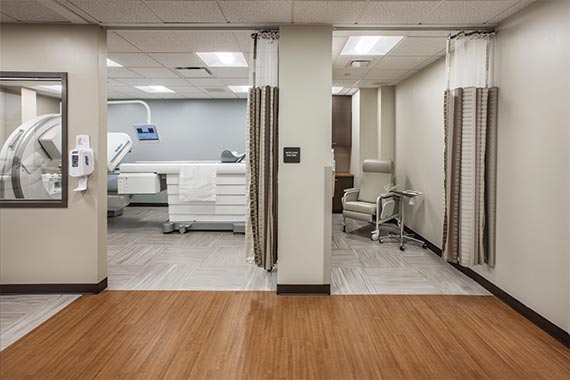 Medical equipment inside the nuclear medicine room at Hunterdon Healthcare, and the adjacent patient area.