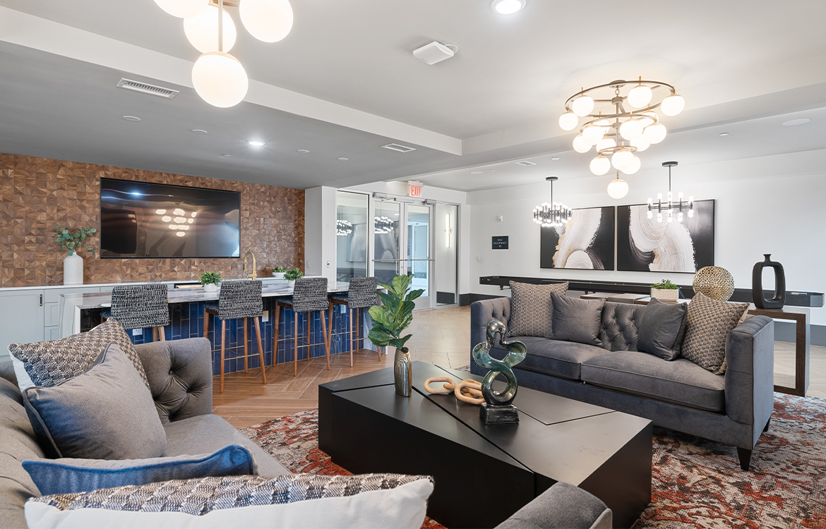 The resident lounge at The Vale, showing high-end finishes and a island/bar serving area, making it an attractive location for private parties.