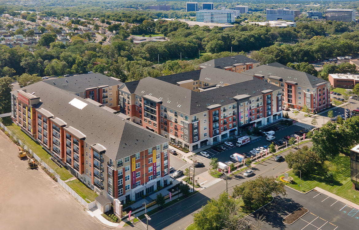 An aerial view showing all four buildings of The Grande at MetroPark development.