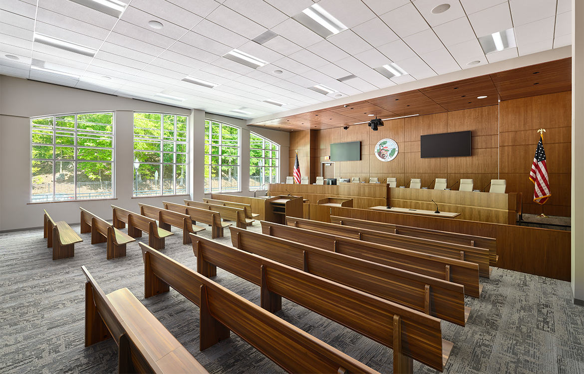 The council chambers and municipal court room at the Ridgefield Municipal Complex includes rich colors and large windows overlooking a nearby nature preserve.