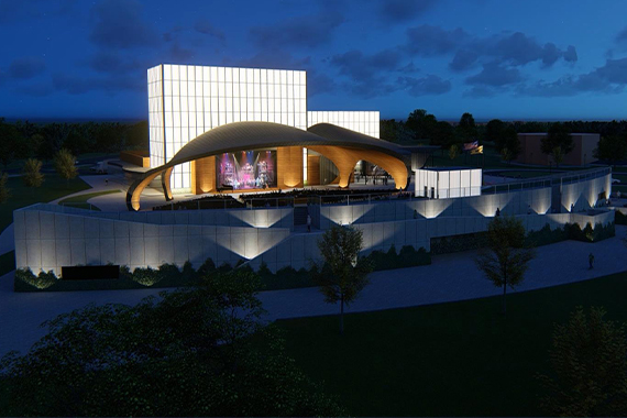 A nighttime renderings shows one design concept for the Stephen J. Capestro Theatre Complex, dominated by dramatic curved canopies.